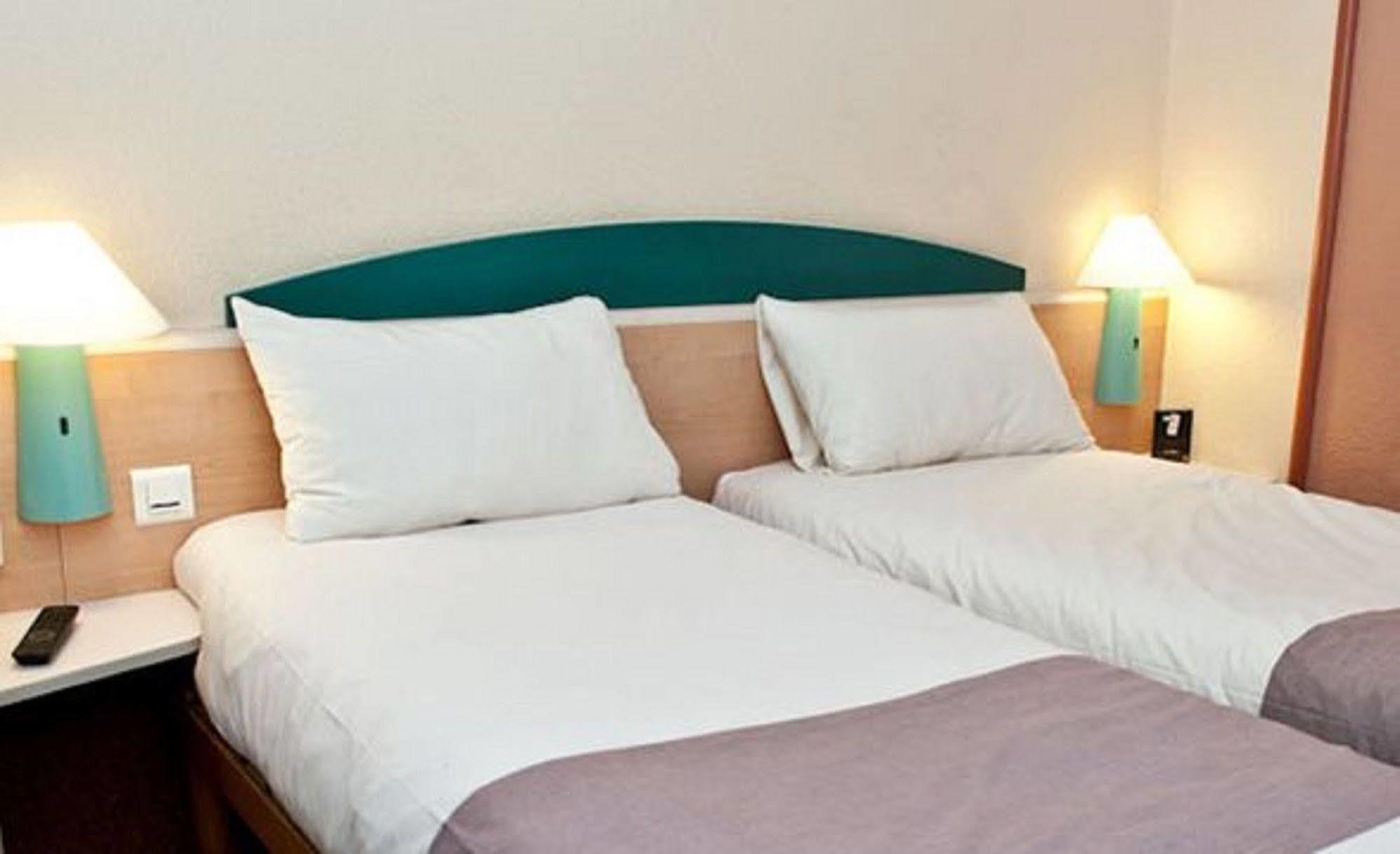 Egg Hotel Gonesse กูเนสส์ ภายนอก รูปภาพ